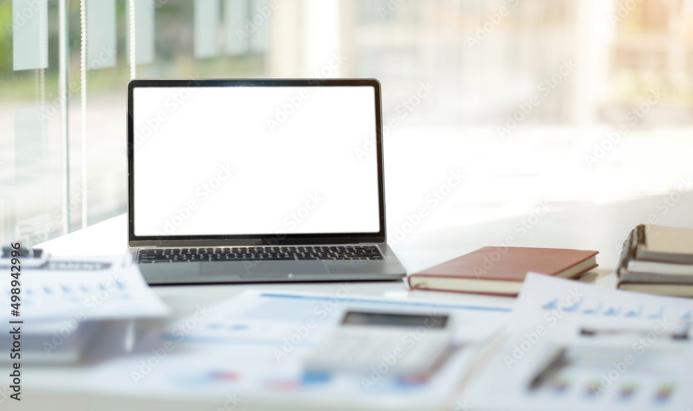 Laptop or notebook with blank screen on the floor service counter in the office. Laptop or notebook with blank screen on the floor service counter in the office.