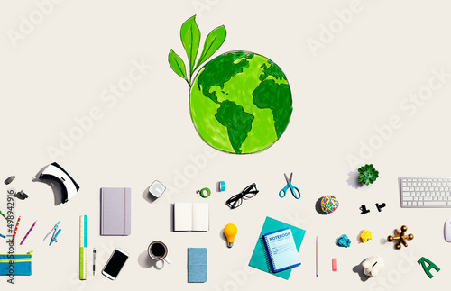 Save earth concept with collection of electronic gadgets and office supplies