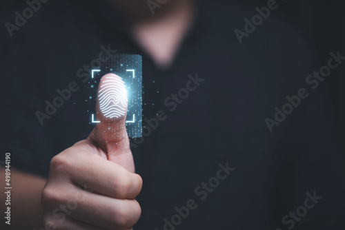 Thumbs up with virtual fingerprint to scan biometric identity and access password thru fingerprints for technology security system and prevent hacker concept. photo