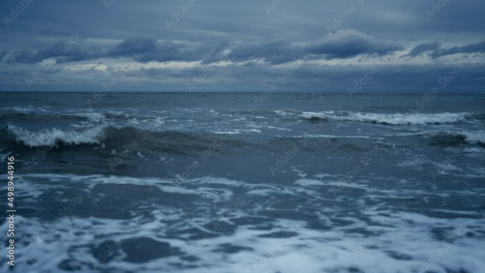 Stormy sea landscape splashing on beach horizon line background. Nature concept. Stormy sea landscape splashing on beach horizon line background. Nature concept.
