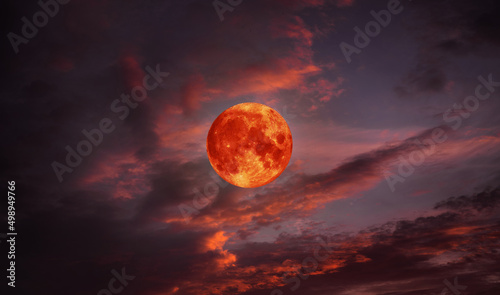 Obraz na plátně blood moon concept of a red full moon in black sky with cloud.