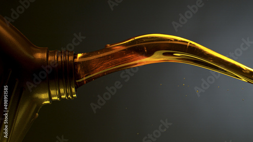 Pouring Oil from Plastic Co...