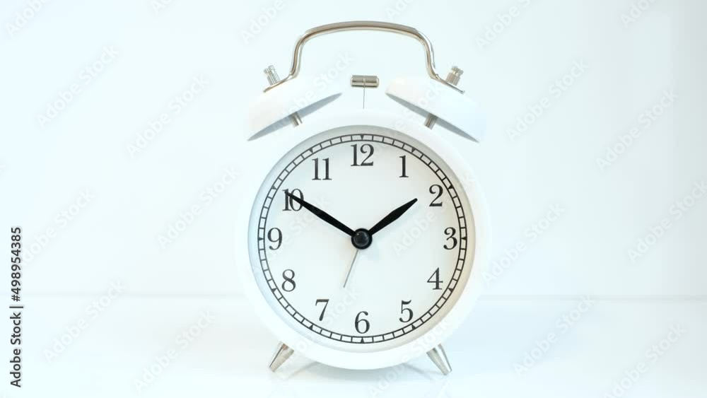 Alarm clock on white background close-up, concept of time management. Alarm clock on white background close-up, concept of time management.
