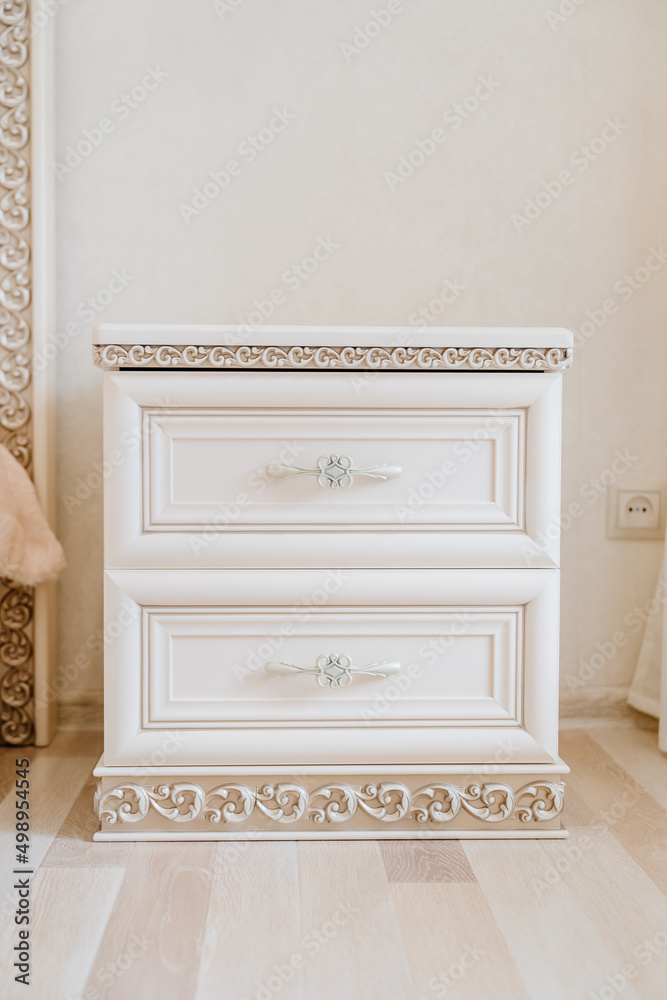 Fototapeta premium bedside table in a classic retro style. furniture and accessories for bedroom.