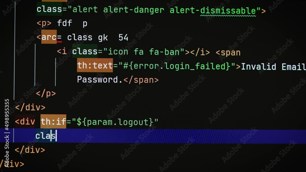 Typing a text code on a laptop screen close-up. Software development work