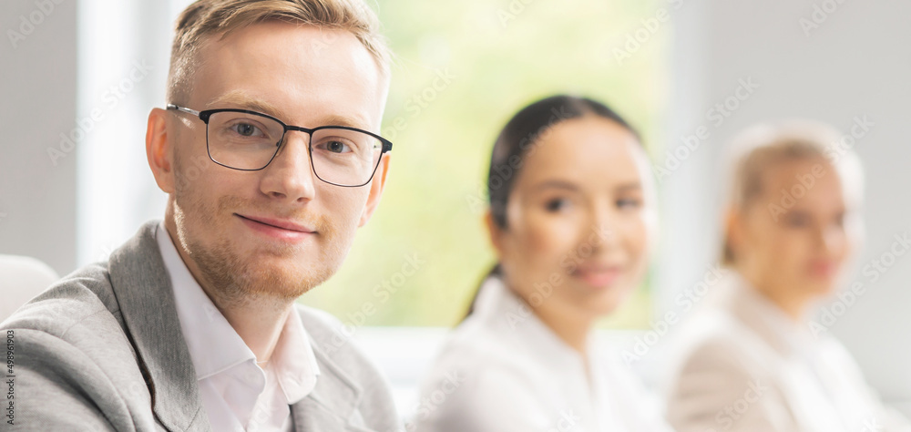 Team of professional support staff working in the office. Colleagues in the workplace solve customer problems. Call center and customer support concept. Team of professional support staff working in the office. Colleagues in the workplace solve customer problems. Call center and customer support concept.
