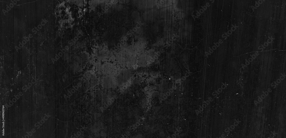 Dark scary black grunge textured concrete stone wall background. Old black wall texture cement