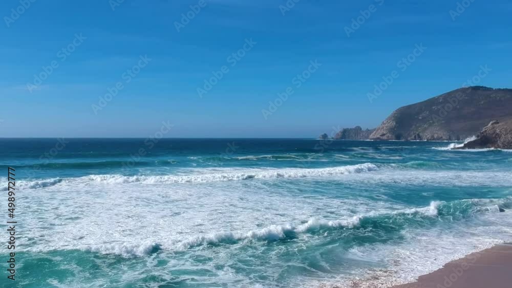 Amazing coastal scenery on Way of St. James, trail in Spain. Sunny day on sandy beach encourage to swim and sunbath - aerial Amazing coastal scenery on Way of St. James, trail in Spain. Sunny day on sandy beach encourage to swim and sunbath - aerial