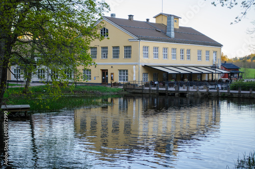 Beautiful building with reflection from a river from Fiskars Finland