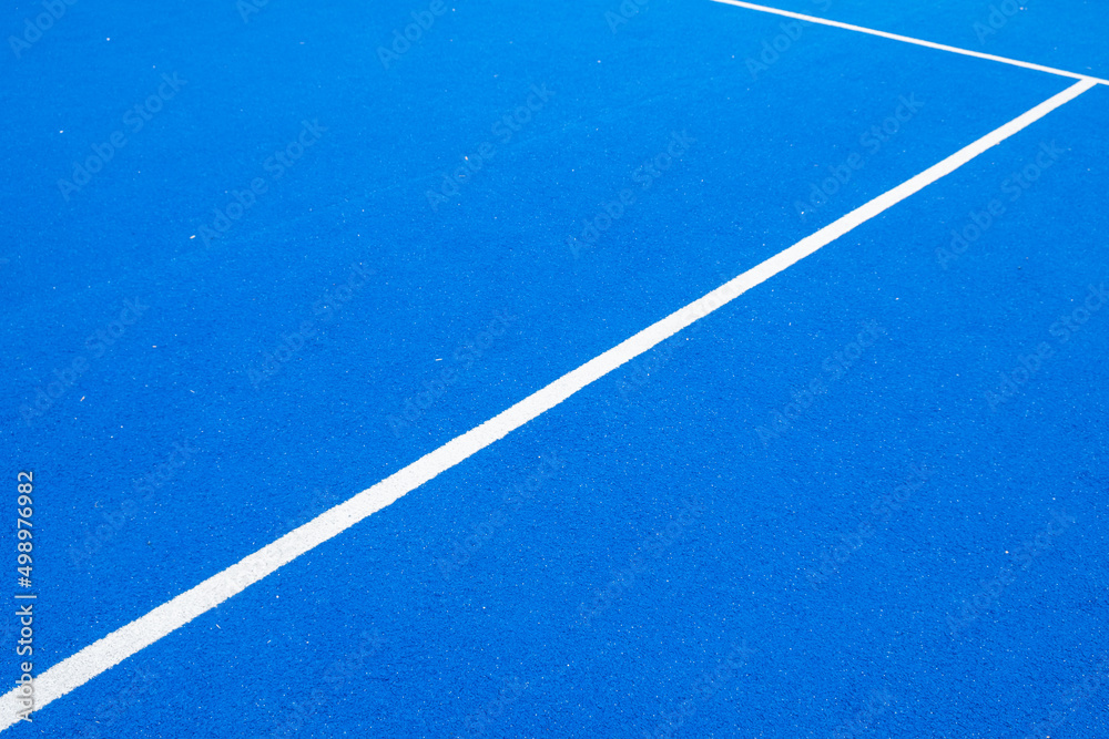 blue paddle tennis court, racket sports concept
