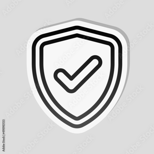 Shield with check mark, logo of protection, simple icon. Linear sticker, white border and simple shadow on gray background