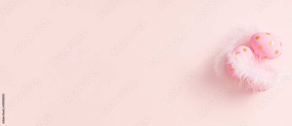 Easter pink composition. Easter eggs on pastel pink background. Minimal concept Easter. Flat lay, top view, copy space. 