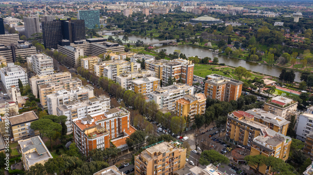 Aerial view of the modern EUR district in Rome, built for the Universal Exposition that should have been held in the Capital in 1942. In the foreground the small lake and the neighborhood park 