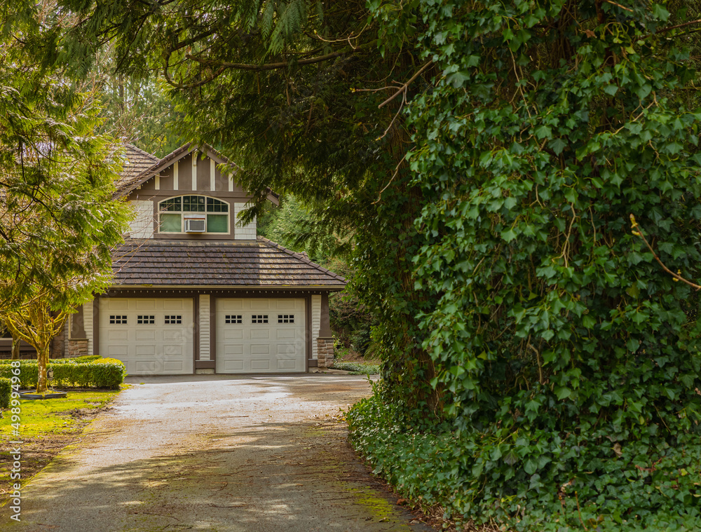 Luxury house with trees in Vancouver, Canada. Big luxury house with a patio Luxury house with trees in Vancouver, Canada. Big luxury house with a patio