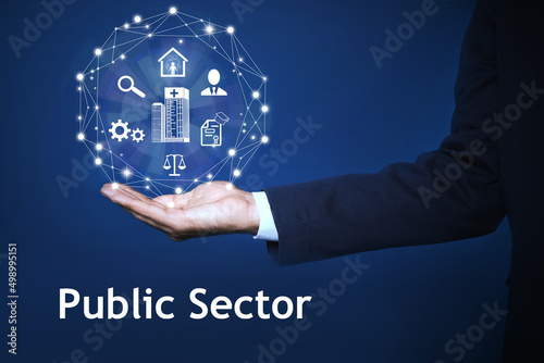 Public Sector concept. Man presenting different virtual icons on blue background, closeup photo