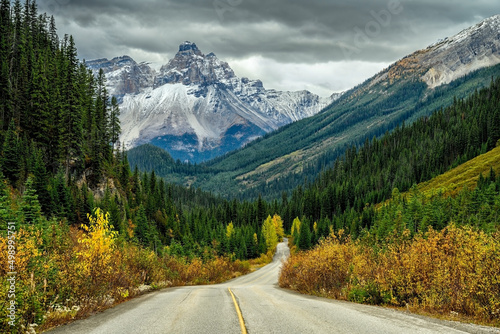 Empty road in the foreground and the Cathedral Mountain in the background in Yoho National Park, British Columbia, Canada