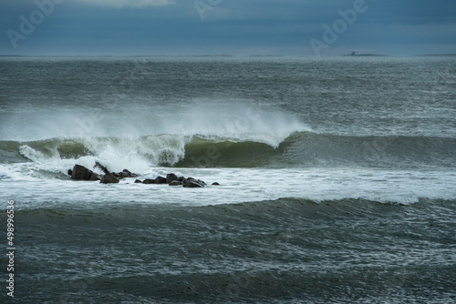 incoming tide on Holy Island, Northumberland, UK