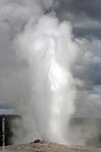 Old Faithful geyser erupting, Yellowstone National Park, Wyoming USA 