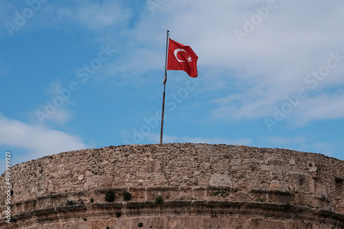Turkish flag on the top of Hidirlik tower. Antalya, Turkey. photo