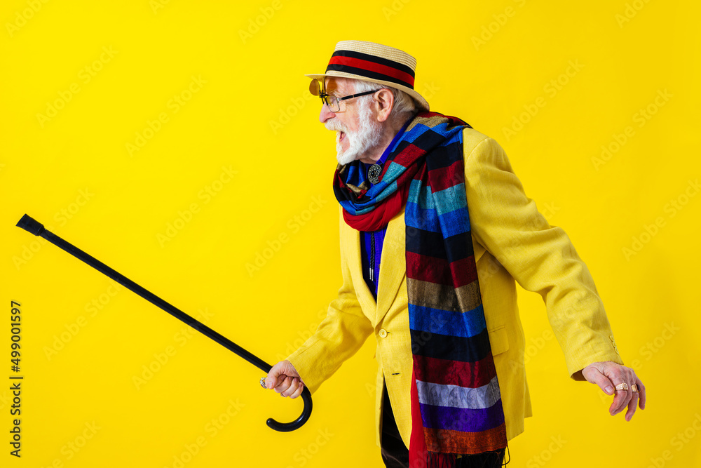 Cool senior man with fashionable outfit portrait - Funny old male person with cool and playful attitude on colorful background Cool senior man with fashionable outfit portrait - Funny old male person with cool and playful attitude on colorful background
