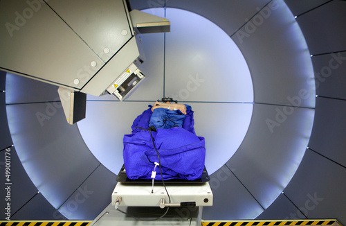 Proton therapy irradiates cancer cells with a beam of protons inside. photo