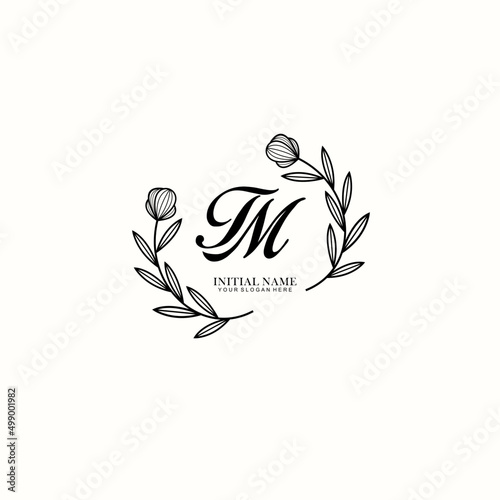 TM Initial letter handwriting and signature logo. Beauty vector initial logo .Fashion  boutique  floral and botanical