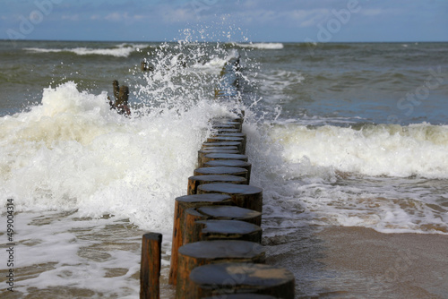 Fototapeta Naklejka Na Ścianę i Meble -  Wooden water cutters in the Baltic Sea, Kaliningrad region, Russia
