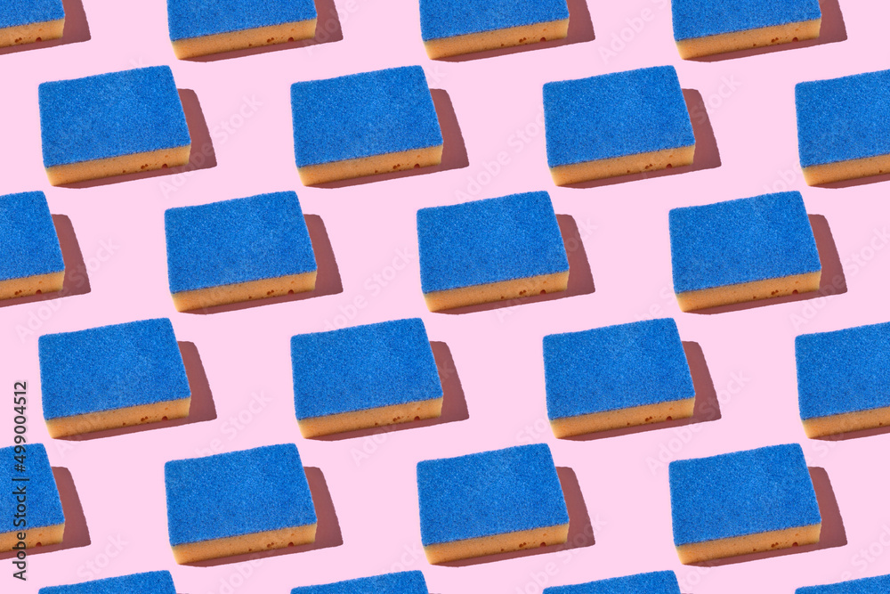 pattern made with blue sponge for washing dishes, blue household cleaning sponge, sponges for washing dishes and other domestic needs.