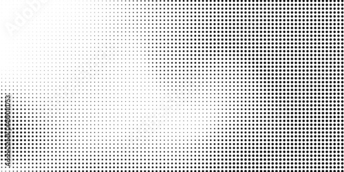 Halftone dotted background. Black dots in modern style on a white background.