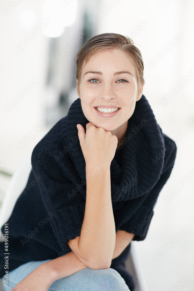 Change the world with your smile. Portrait of a smiling young woman alone at home. Change the world with your smile. Portrait of a smiling young woman alone at home.