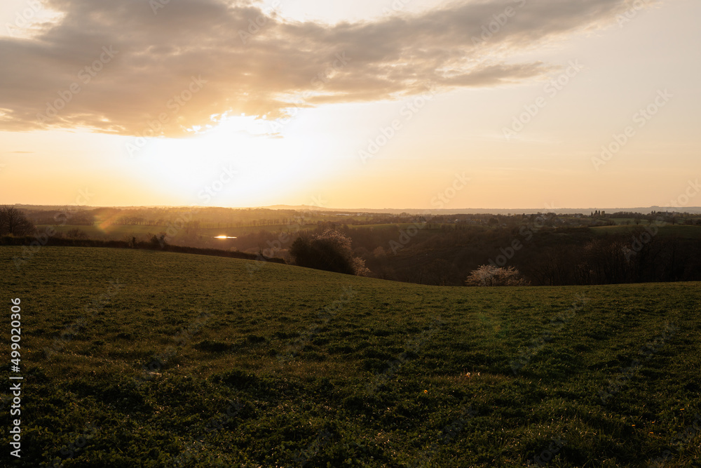 Green field country side during sunset