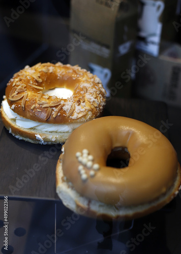 mini roscones de chocolate y nata con almendras photo