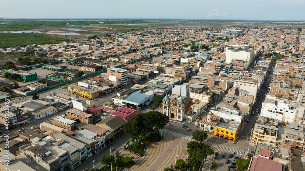 Fototapeta premium Aerial shot of the main park, church and city of Tumbes, Peru