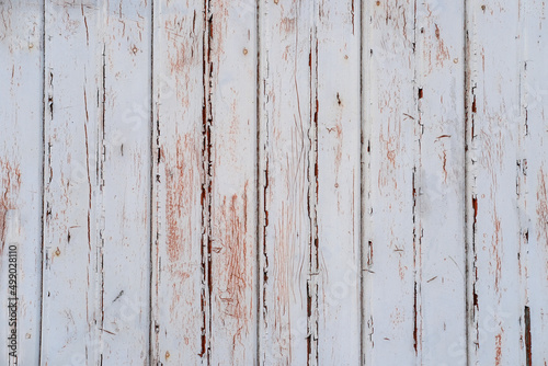 close-up of brown planks of construction with old paint, natural wood texture, narrow boards, horizontal, wallpaper, building material, background for designer with copy space