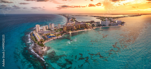 Cancun beach with beautiful sunset photo