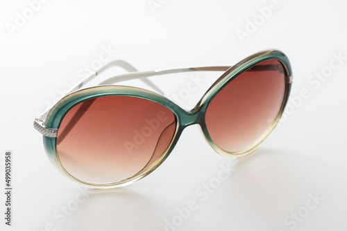 Trendy Women's glasses. fashion still life. female sunglasses on withe background.