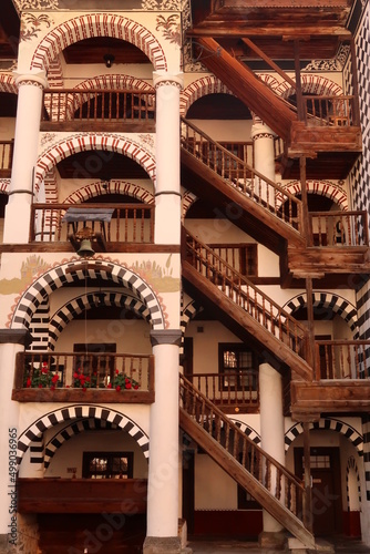 The many stairways leading up to the residential part of Rila Monastery photo