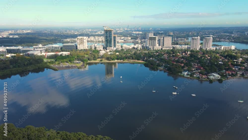 Aerial drone view of Rhodes, an Inner West suburb of Sydney looking over McIlwaine Park and Brays Bay along Parramatta River Aerial drone view of Rhodes, an Inner West suburb of Sydney looking over McIlwaine Park and Brays Bay along Parramatta River