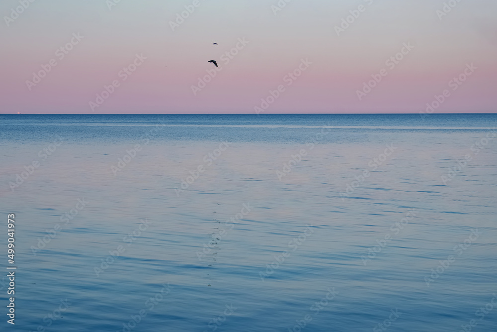 Calm sea and sky after sunset.