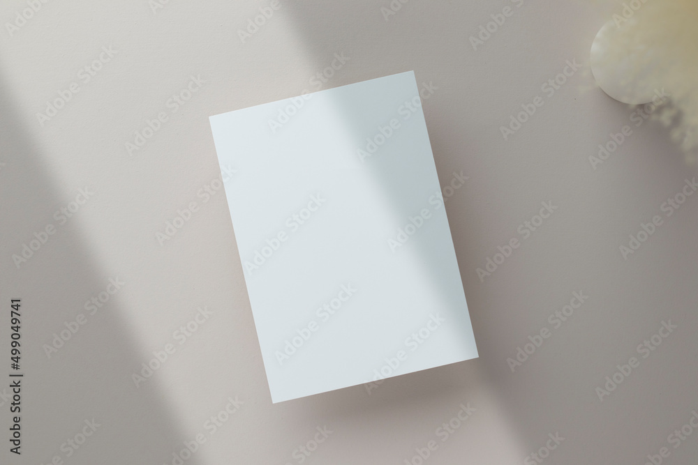 Blank greeting card invitation Mockup 5x7 on envelope with dry flowers and ribbon on paper background, flat lay, mockup Blank greeting card invitation Mockup 5x7 on envelope with dry flowers and ribbon on paper background, flat lay, mockup