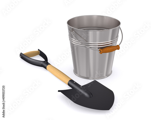 empty metal bucket and shov...
