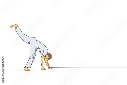 One continuous line drawing of young sporty Brazilian fighter man training capoeira on the beach. Healthy traditional fighting sport concept. Dynamic single line draw design vector illustration