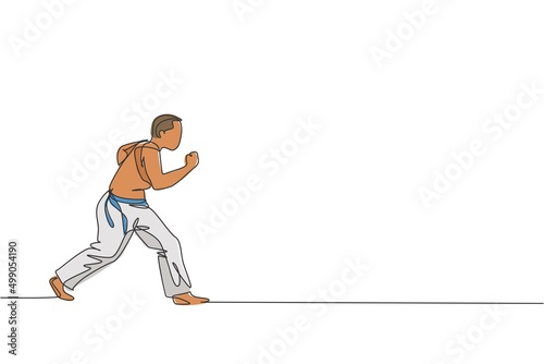One continuous line drawing of young sporty Brazilian fighter man training capoeira on the beach. Healthy traditional fighting sport concept. Dynamic single line draw design vector illustration