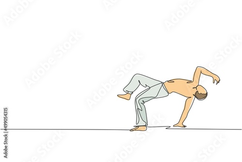 Single continuous line drawing of young sportive man practice Brazilian capoeira move dance at outdoor street. Culture martial art and sport concept. Trendy one line draw design vector illustration