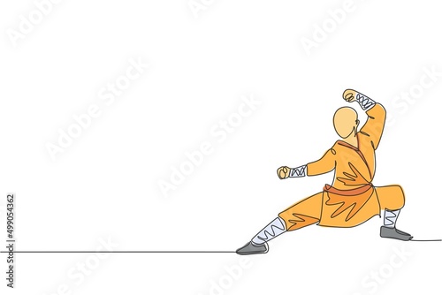 Single continuous line drawing young muscular shaolin monk man train martial art at shaolin temple. Traditional Chinese kung fu fight concept. Trendy one line draw graphic design vector illustration