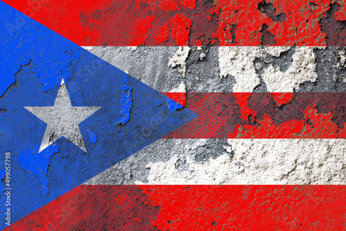 Puerto rico flag painted on a damaged old wall surface