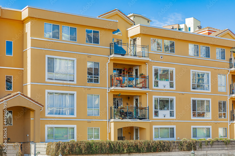 Fototapeta premium Neighborhood modern houses on sunny day in BC, Canada. Canadian modern residential architecture.
