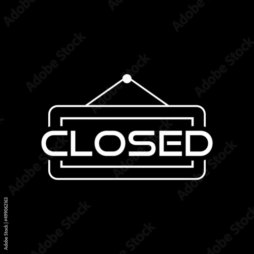 Closed sign isolated on dark background