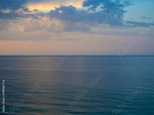 Fototapeta Naklejka Na Ścianę i Meble -  Morning landscape with cloudy sky and ripples at sea in Ukraine. Beautiful colorful seascape. Wide deep blue sea ocean ripples. Nautical background