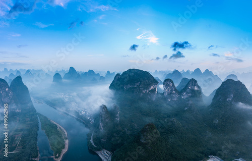 Fotografie, Obraz Aerial view of beautiful mountain and river with fog natural landscape in Guilin, China